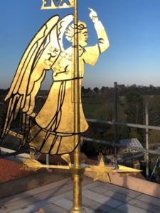 Archangelevening Newly-gilded Archangel is re-installed